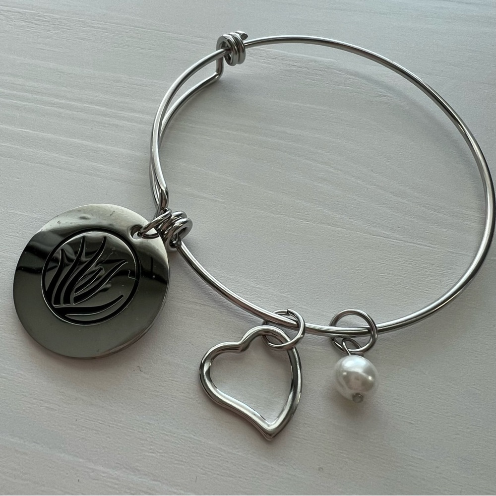 NWOT Silver Charm Bracelet with Aloe Symbol
